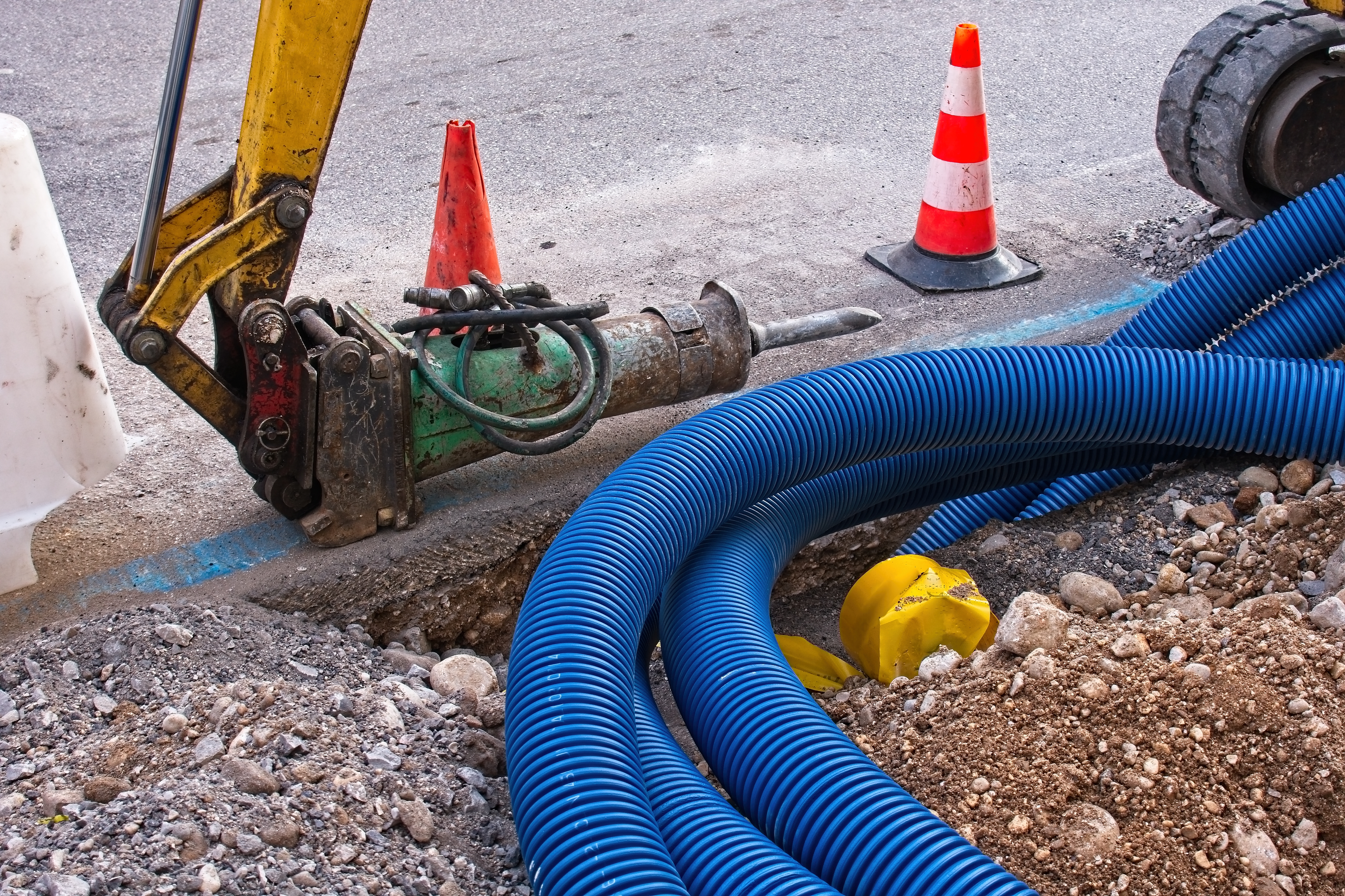 Hydraulic drilling equipment performing horizontal directional drilling for underground utility installation
